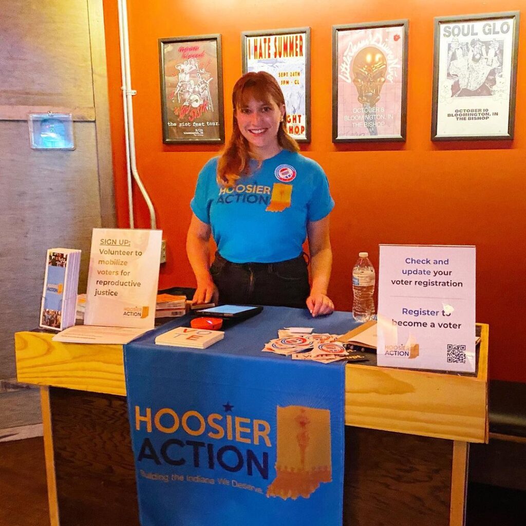 Image: Tracey Hutchings-Goetz hosting a Medicaid table
